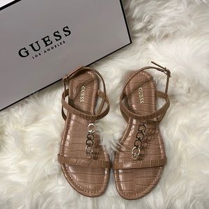 New Size 6 Guess sandals with golden G’s. Color: medium natural (nude)